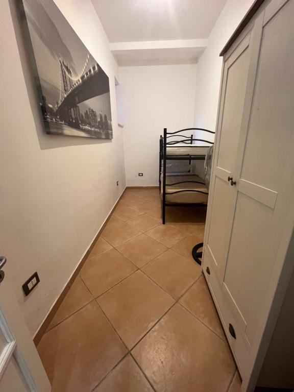 Postel nebo postele na pokoji v ubytování L' Arco Antico