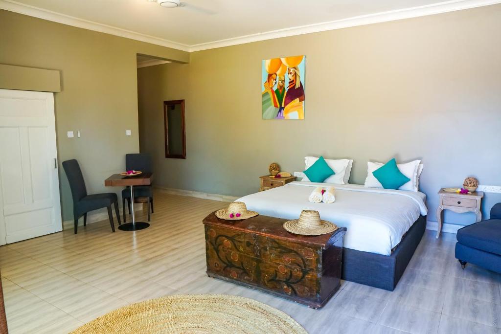 Postel nebo postele na pokoji v ubytování Aquamarina Hotel