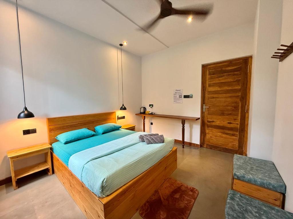 Postel nebo postele na pokoji v ubytování Ella Inn Hotel