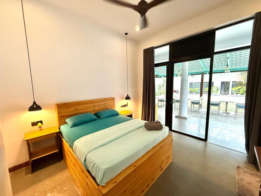 Postel nebo postele na pokoji v ubytování Ella Inn Hotel