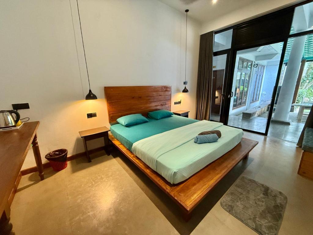 Postel nebo postele na pokoji v ubytování Ella Inn Hotel