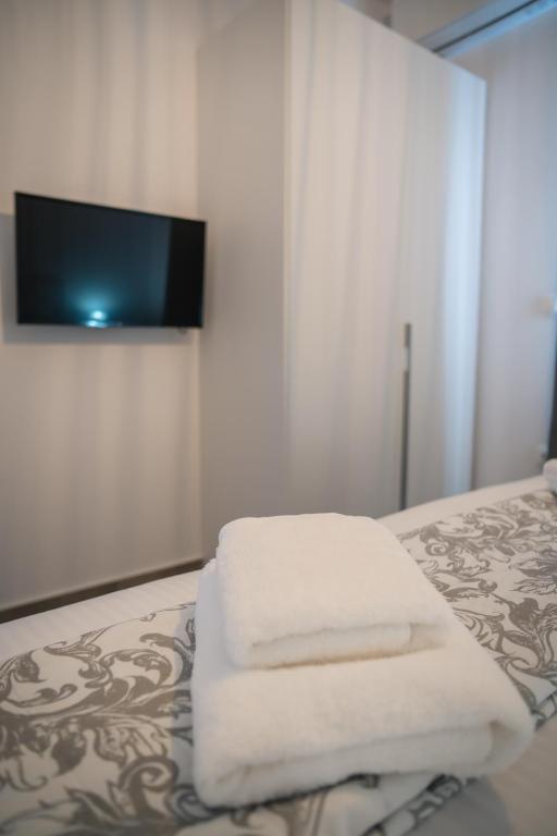 Postel nebo postele na pokoji v ubytování Di La Suite