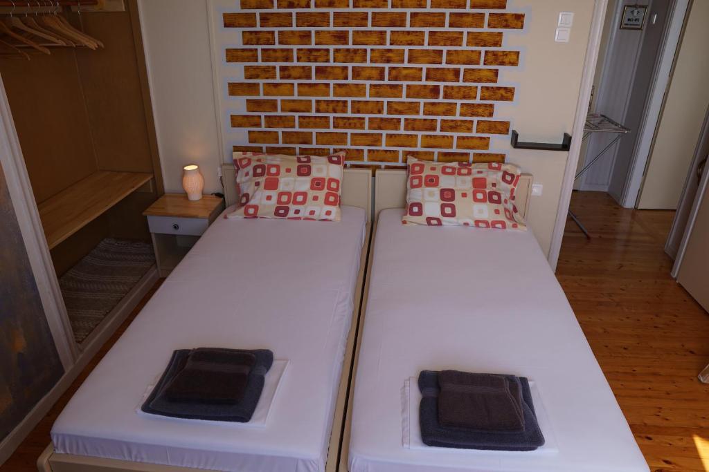 Postel nebo postele na pokoji v ubytování Sea And Sun apartments 304 Ιδιωτικό διαμέρισμα