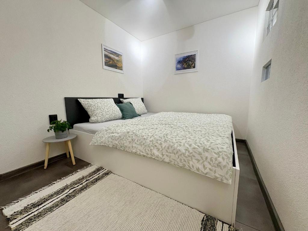 Postel nebo postele na pokoji v ubytování Apartmány Faunapark