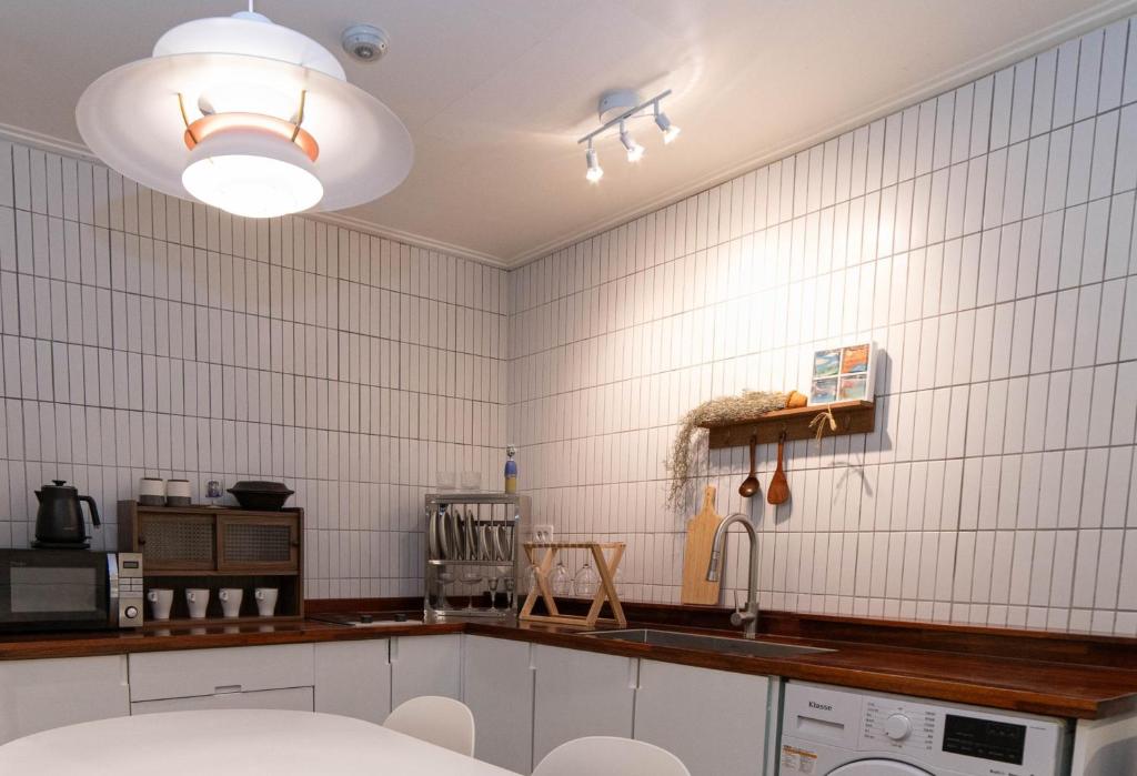 Kuchyň nebo kuchyňský kout v ubytování Cloud 9 Hongdae