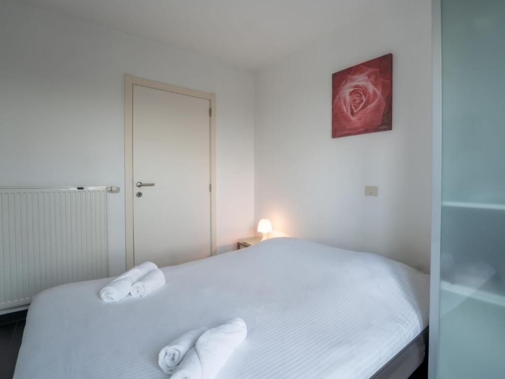 Postel nebo postele na pokoji v ubytování Apartment Appartement 402 by Interhome