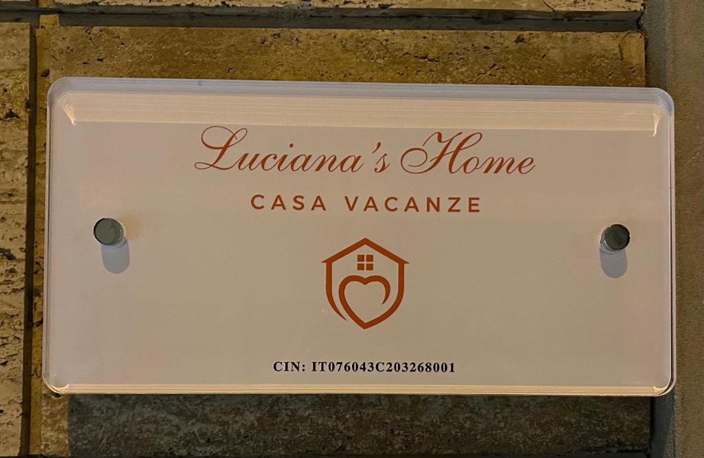 Certifikát, hodnocení, plakát nebo jiný dokument vystavený v ubytování Luciana's home