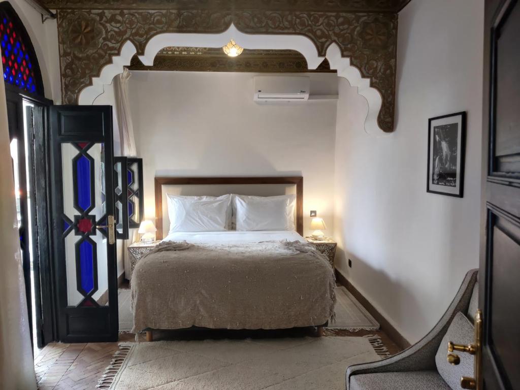 Postel nebo postele na pokoji v ubytování The Grand Riad and Spa