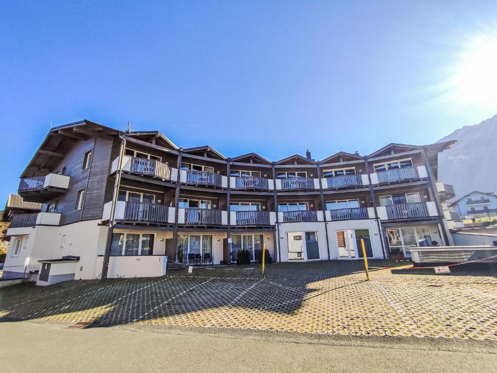 a large building with a lot of windows at Studio Rehkitz by Interhome in Kaprun