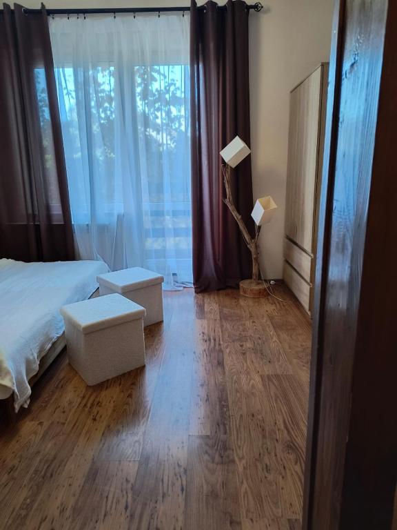 Postel nebo postele na pokoji v ubytování Willa Sarna
