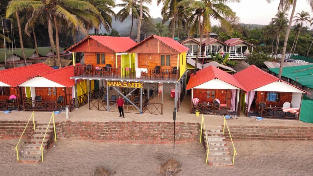 an aerial view of a resort with houses and tables at Nana&#39;s Nook in Agonda
