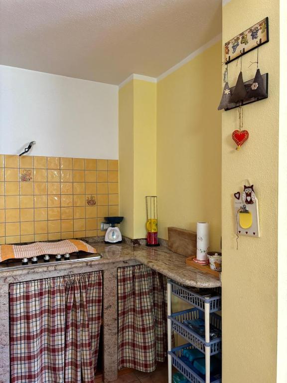 Kuchyňa alebo kuchynka v ubytovaní Appartamento accogliente