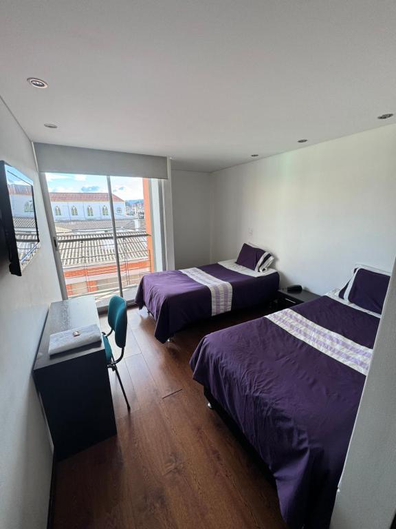 Postel nebo postele na pokoji v ubytování Hotel link