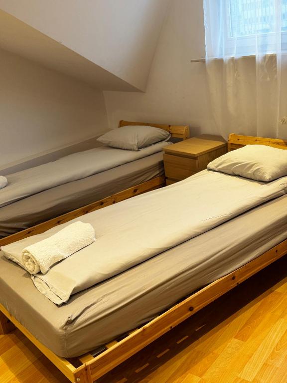 Postel nebo postele na pokoji v ubytování ESA Home
