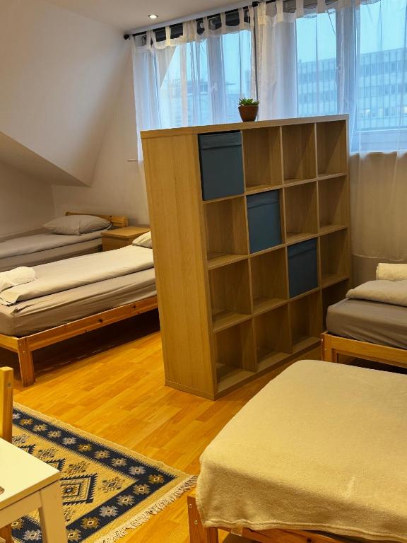 Postel nebo postele na pokoji v ubytování ESA Home