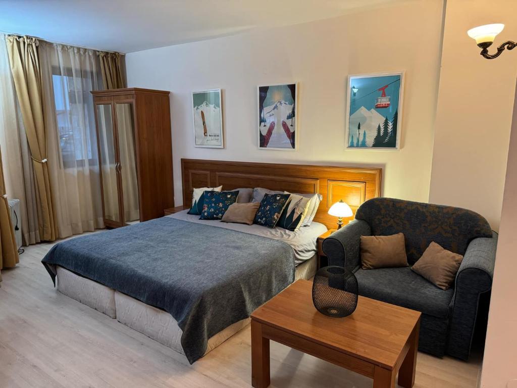 Ένα ή περισσότερα κρεβάτια σε δωμάτιο στο Emerald Apartment - complex Bansko