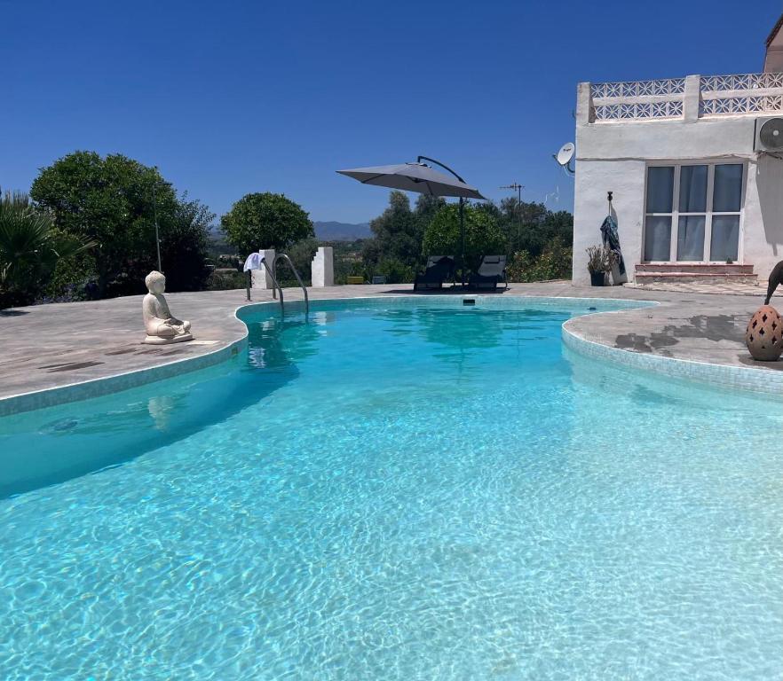 Πισίνα στο ή κοντά στο Finca Raziel