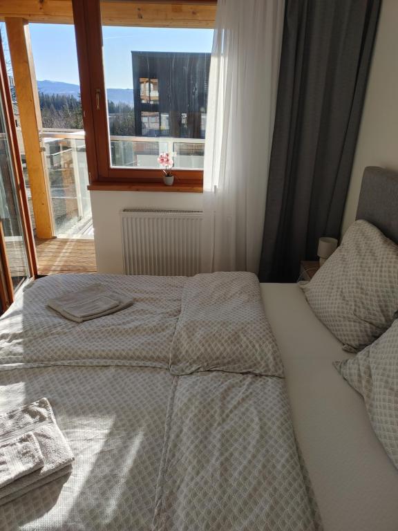 Postel nebo postele na pokoji v ubytování Apartment Kukučka - Tatranská Štrba