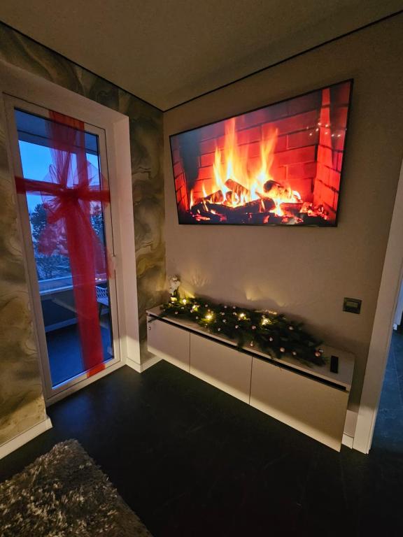 TV a/nebo společenská místnost v ubytování Belts Apartaments