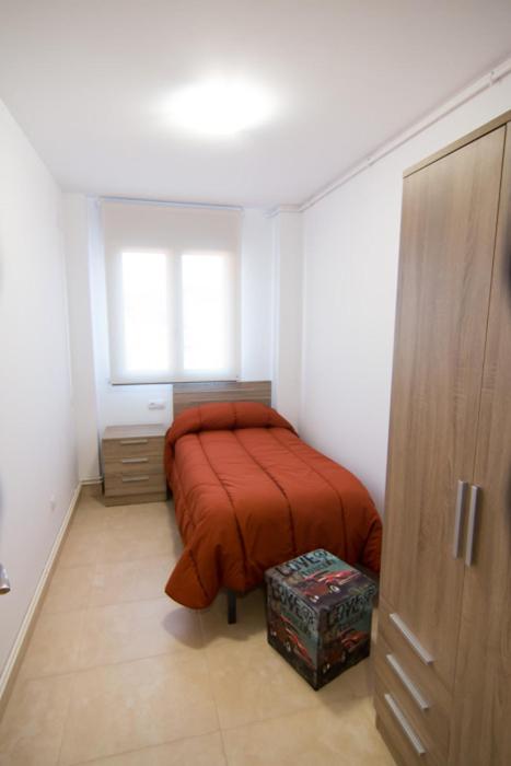 Posteľ alebo postele v izbe v ubytovaní Apartament Bagà
