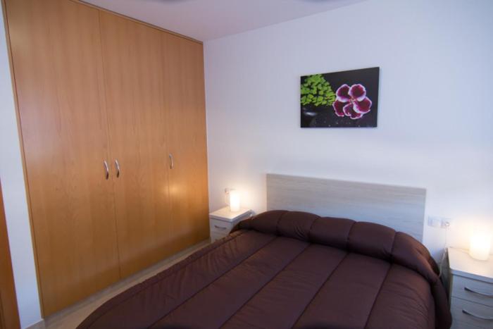 Posteľ alebo postele v izbe v ubytovaní Apartament Bagà