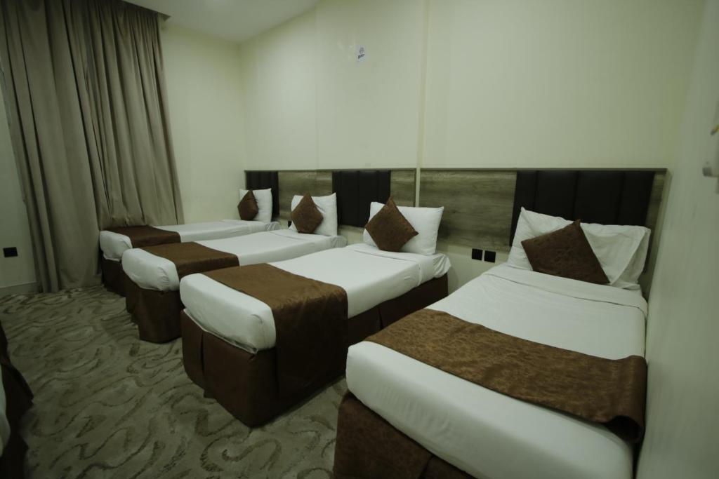Postel nebo postele na pokoji v ubytování Mila HOTEL MAKKAH