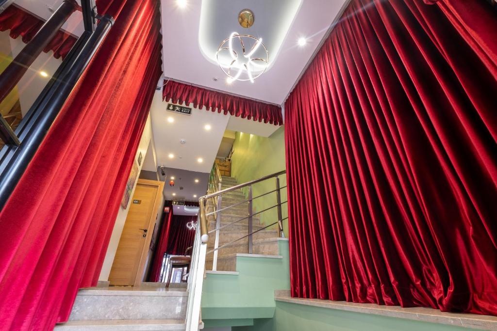 a set of red curtains in a store at İstanbulites Hotel in Istanbul
