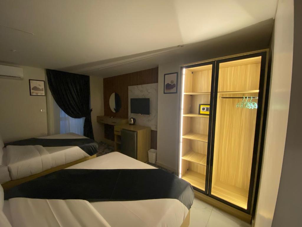 Postel nebo postele na pokoji v ubytování Giza Pyramids Boutique Hotel
