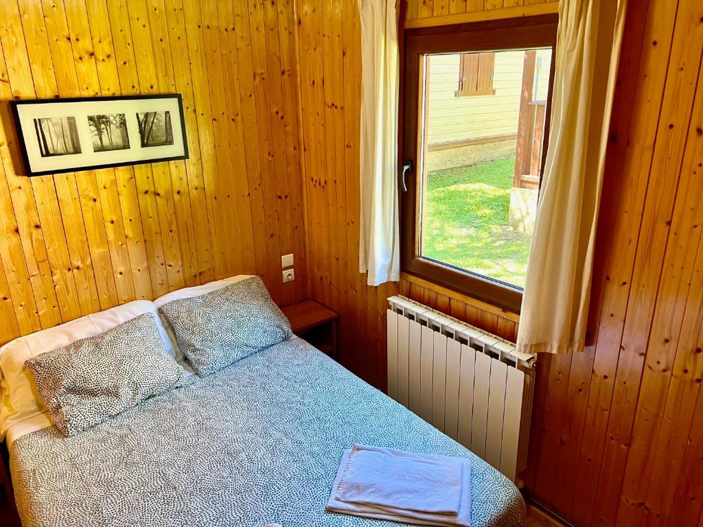 Postel nebo postele na pokoji v ubytování Camping Valle de Hecho