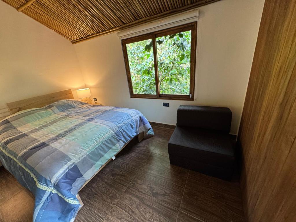 Postel nebo postele na pokoji v ubytování Cabaña Coffee Suite
