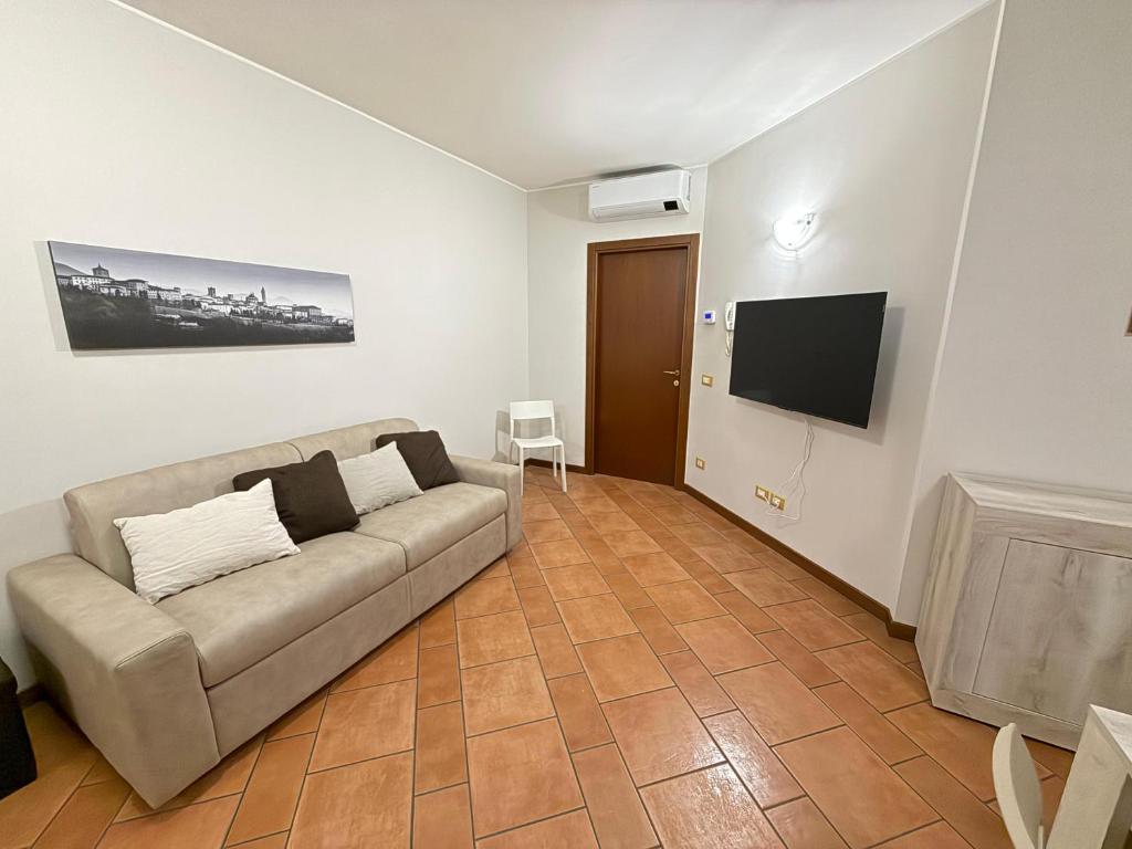 TV a/nebo společenská místnost v ubytování Casa Gemma