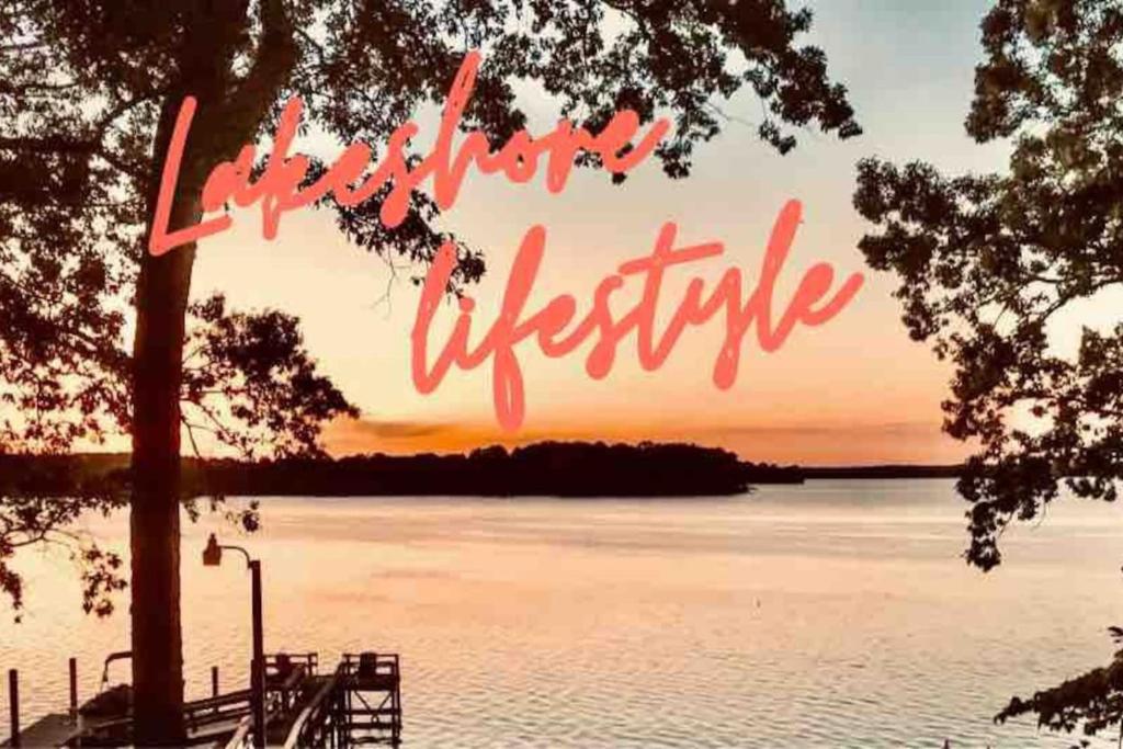 a sunset over a lake with the words happy wishes at Small piece of heaven on the lake - King suite in Richfield