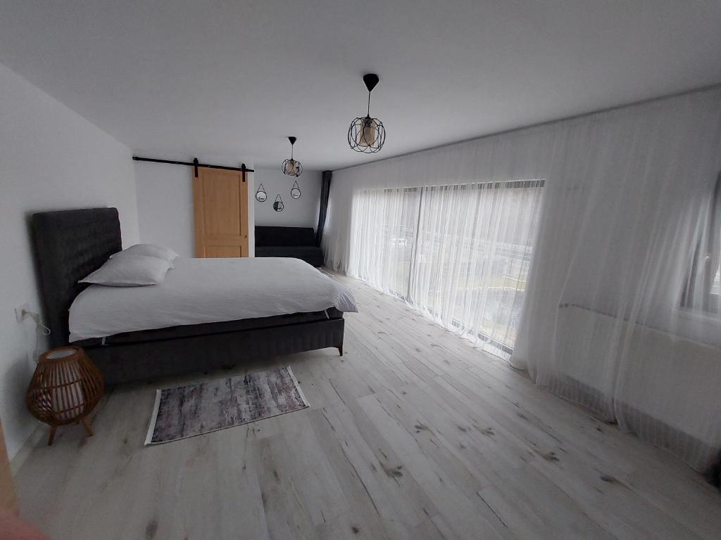 Postel nebo postele na pokoji v ubytování Casa Kaf