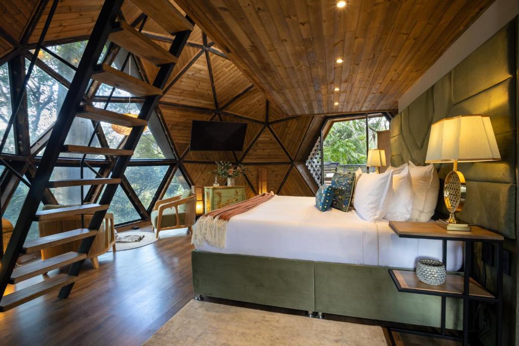 Postel nebo postele na pokoji v ubytování GreenOriental Resort