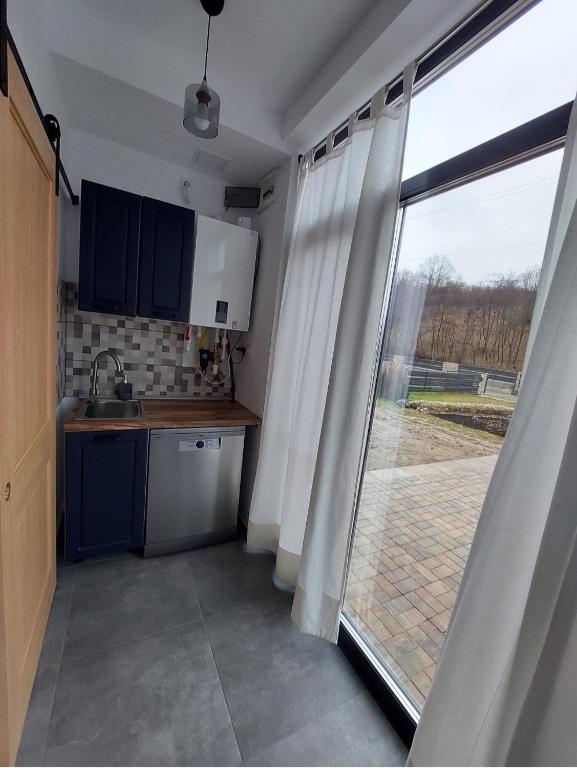 Kuchyň nebo kuchyňský kout v ubytování Casa Kaf