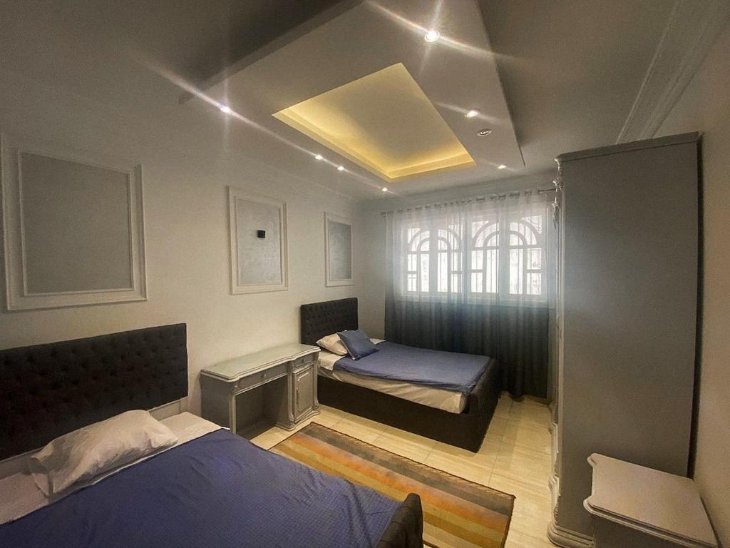 Postel nebo postele na pokoji v ubytování Luxurious apartment in Loran Alexandria 250m2