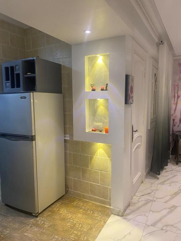 Kuchyň nebo kuchyňský kout v ubytování Luxurious apartment in Loran Alexandria 250m2