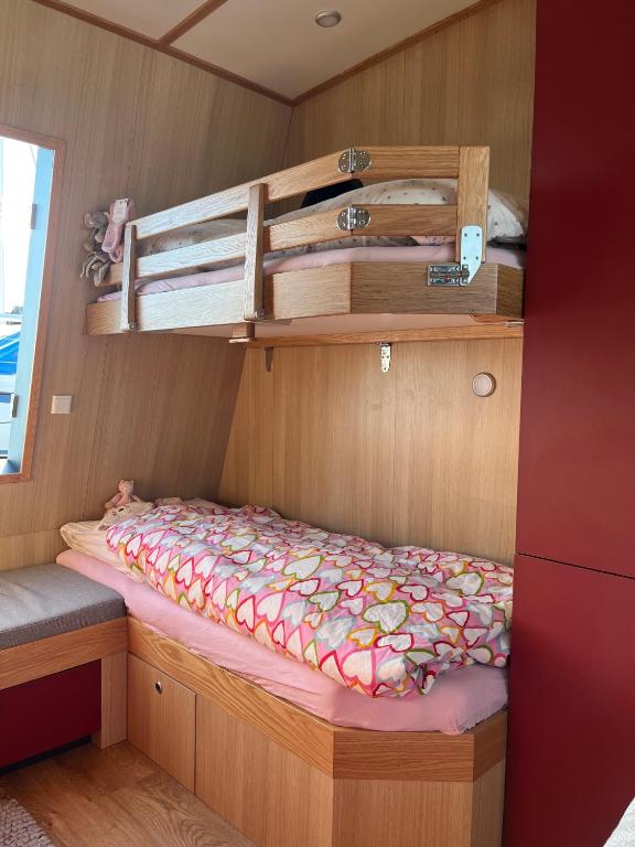 Postel nebo postele na pokoji v ubytování MADUCO Waterfront