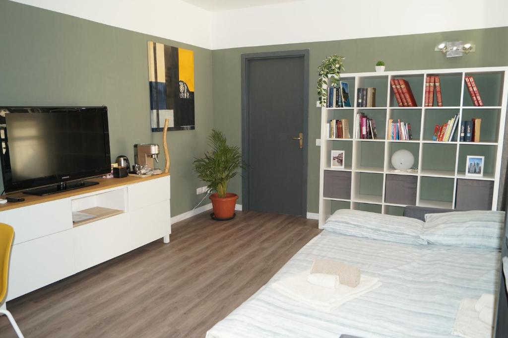 A television and/or entertainment centre at Navigli-Darsena In the Heart of the City