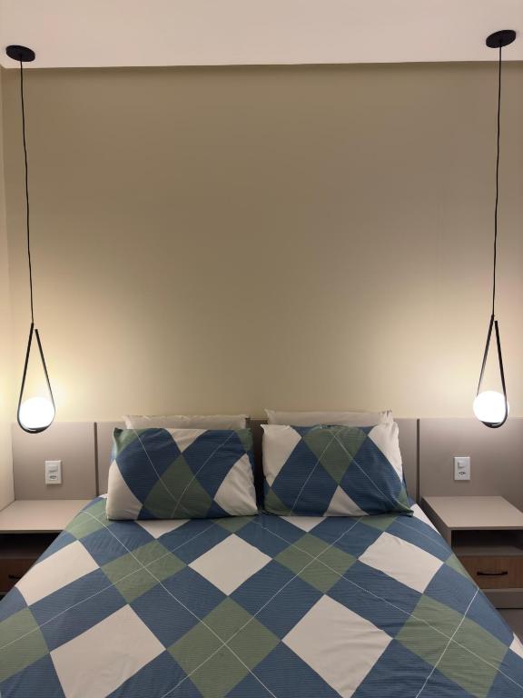 Postel nebo postele na pokoji v ubytování Flat em Alter do Chão