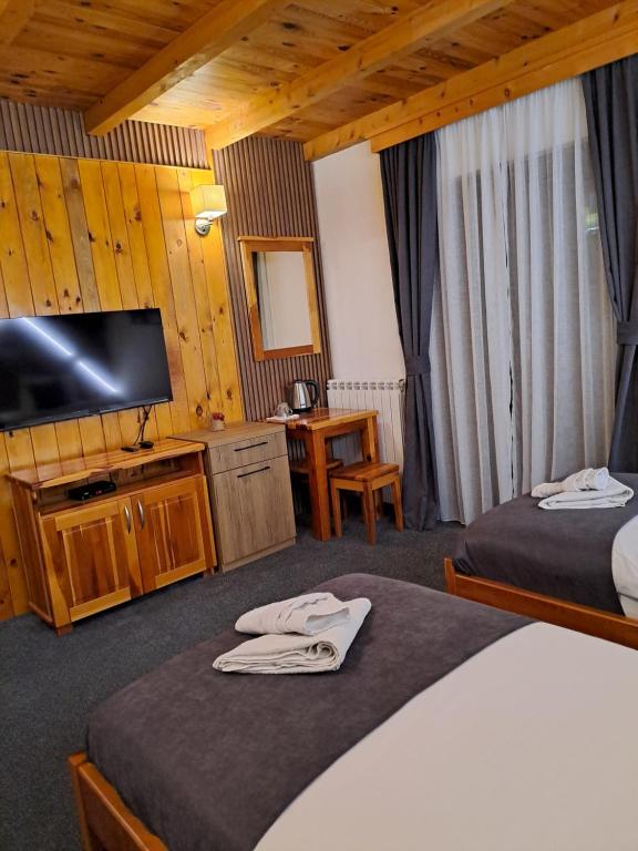 Postel nebo postele na pokoji v ubytování Rooms and apartmants Mirovic