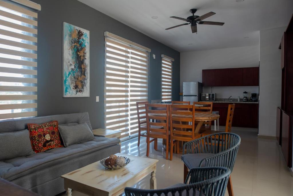 a living room with a couch and a table at 2br/2ba Condo 1 block to ocean! - Unit 4 in Mazatlán