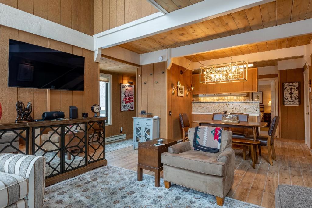 a living room with a couch and a table at Creekside Condo 1296 in Sun Valley