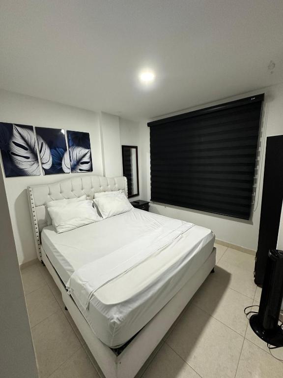 Postel nebo postele na pokoji v ubytování Apartamento luminoso y moderno