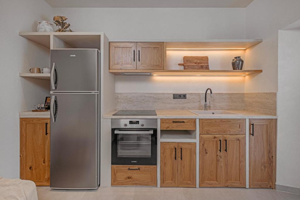 Kuchyň nebo kuchyňský kout v ubytování Noema Lindos - Agapitos Apartment