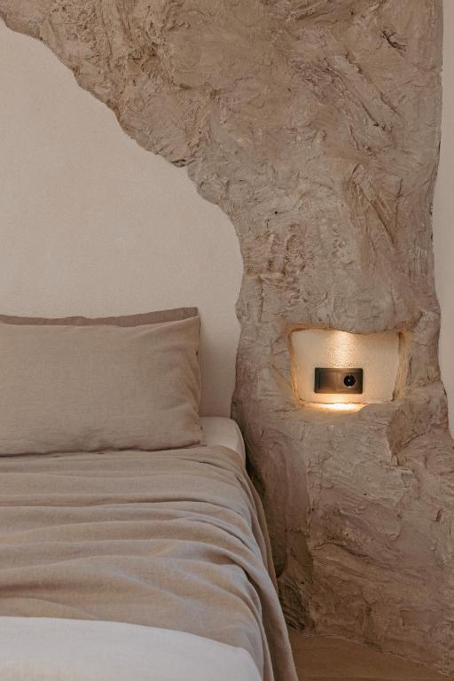 Postel nebo postele na pokoji v ubytování Noema Lindos - Agapitos Apartment