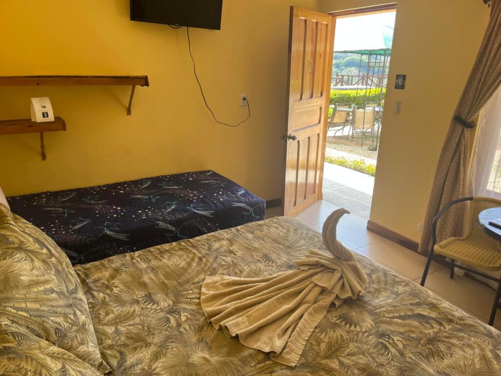 TV a/nebo společenská místnost v ubytování Hotel Orocay Lodge