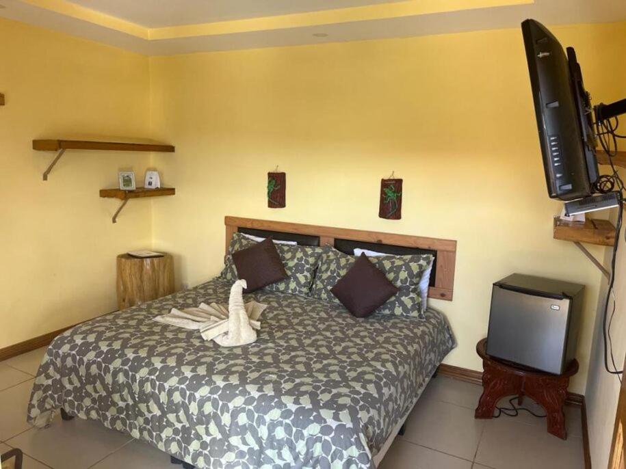 Postel nebo postele na pokoji v ubytování Hotel Orocay Lodge