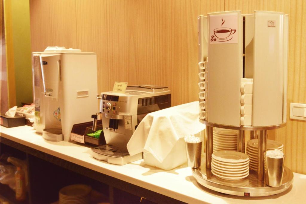 Příslušenství pro přípravu čaje a kávy v ubytování 新麗旅店 Newful Hotel