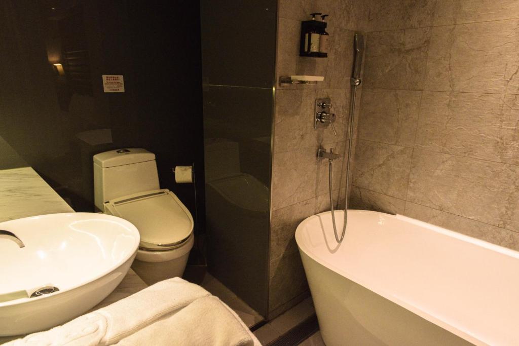 Koupelna v ubytování 新麗旅店 Newful Hotel